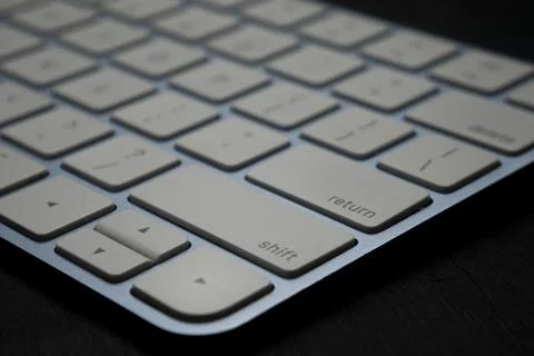 Close-up of white keyboard return key Stock Photos