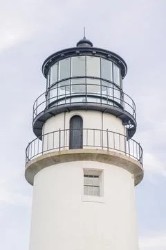 Close up of white lighthouse tower providing guidance, navigation Stock Photos
