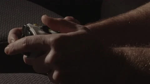 Close up of white male hands playing with videogame controller Stock Footage 221756862