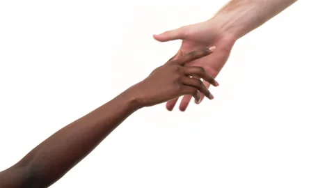 Close up of a white man giving a helping hand to a black woman hand. Isolated on Stock-Footage 161905243