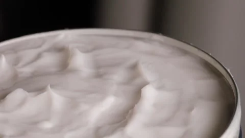Close-up of white moisturizer for face and body. Stock Footage 299940366