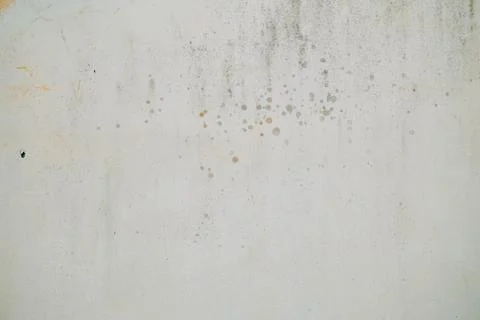 Close-up of white paper texture with subtle creases and small black specks .. Stock Photos