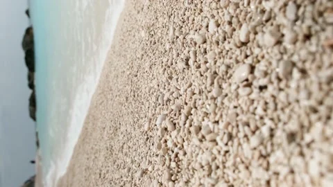Close up of white pebbles at the beach with turquoise sea. Stock Footage 158323449