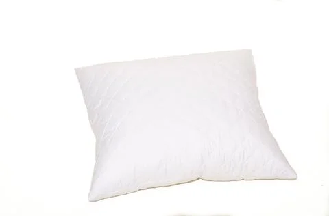 Close up of a white pillow on background Stock Photos
