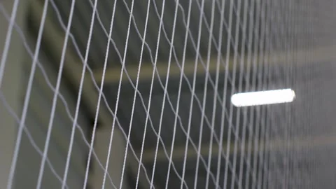 Close-up of White Protective Netting Indoors Stock Footage 311796574