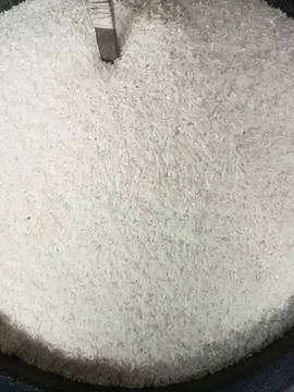 Close-Up of White Rice in a Container Stock Photos