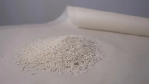 Close-up of white rice on the table. Close-up of camera movement around a Stock Footage 105314571