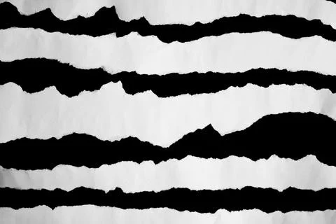 Close up of a white ripped or torn piece of paper with copy space. Stock Photos