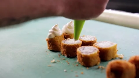 Close-up of White Sauce Being Added to Sushi Stock Footage 288578531