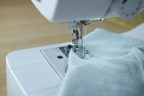 Close-up of white sewing electric computer machine, stitches appear step by s 스톡 사진