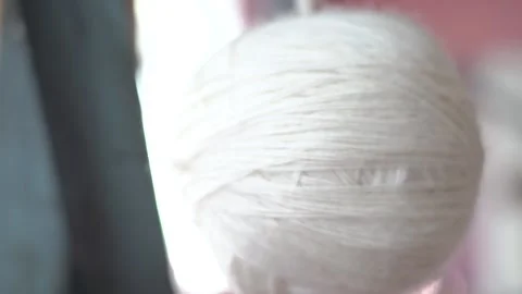 Close-Up Of White Skeins Of Thread Designed For Weaving Carpets Stock Footage 239820233