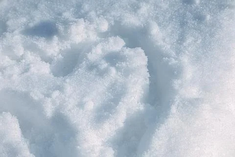 Close up of white snow texture with soft shadows Stock Photos