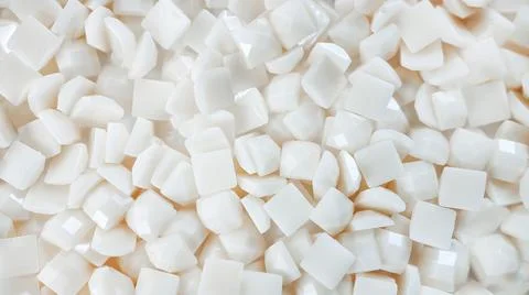 Close-up, white square diamonds for diamond embroidery. Hobbies and DIY Stock Photos