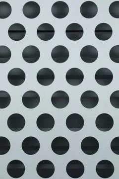 Close-up of white surface with large black dots Stock Photos