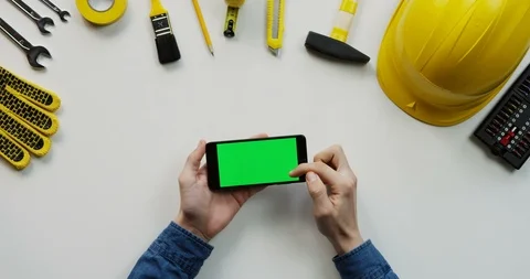 Close up of the white table with building instruments on which man's Caucasian Video stock 96036257