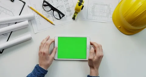 Close up of the white table with building instruments on which man's Caucasian Stock Footage 96043447