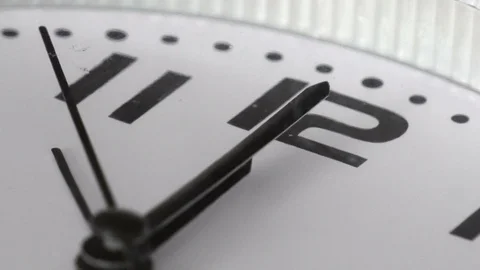 Close up of a white ticking clock, midnight 스톡 동영상 125451536