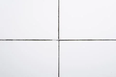 Close up of a white tile floor can be used as a background. Foto stock