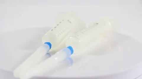 A close up of a white toothbrush Stock Footage 128828773