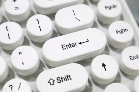 Close-up of a white typewriter style mechanical keyboard with Enter and Shi.. Stock Photos