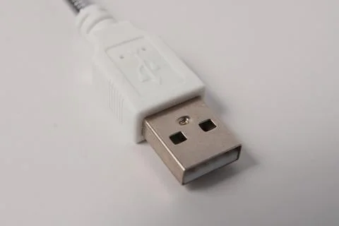 Close-up White USB-A Connector on Silver Cable for Technology Data Transfer.. Stock Photos