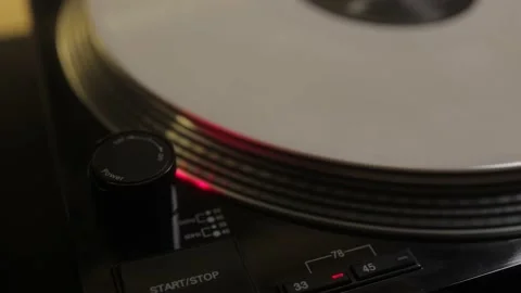 Close up white vinyl record spinning and playing Video stock 157081078