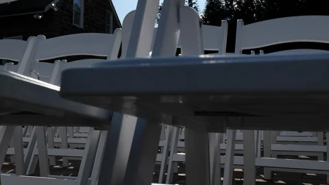 Close up white wedding chairs move up reveal Stock Footage 114185980