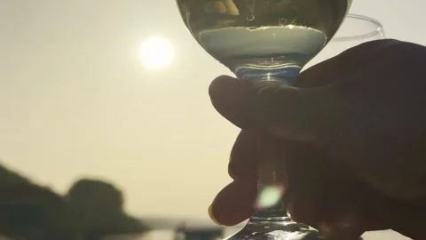 Close Up of White Wine Glasses at Sunset Outdoor Picnic Video stock 334134678