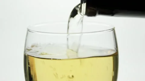 Close up white wine pour Stock Footage 12582045