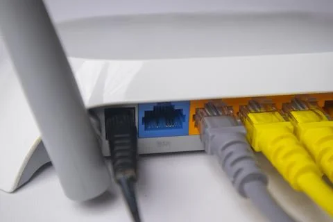 Close-up of a white wireless router back panel, emphasizing the labelled WA.. Stock Photos