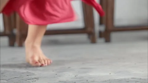 Close up of white woman's legs dancing red dress and nails Stock Footage 278274961