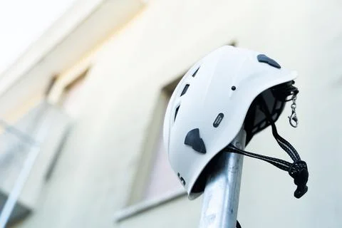 Close up of a white work hat. Construction site. Workers. Stock Photos