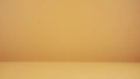 Close-up of whole coconut falls on table and crashes in slow motion Stock Footage 125014624