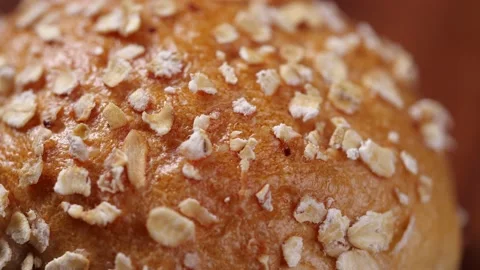 Close-up of Whole grain bread rotate in slow motion Stock-Footage 143373538