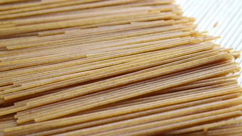 Close up whole wheat spaghetti, uncooked pasta Stock Footage 151248245