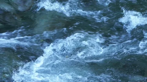 Close-Up of Wild Mountain River Flowing Over Rocks Stock Footage 320967339