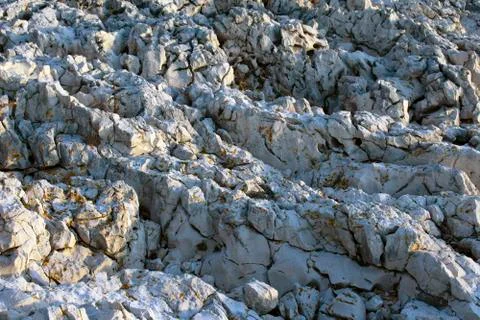 Close up of wild rocks on a beach Stock Photos