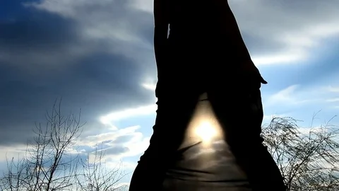 Close-up of a wind blowing a transparent skirt against the sky Stock Footage 82333237