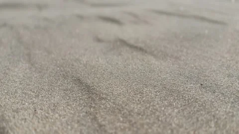 Close-Up of Wind-Blown Sand on Dunes with Blurred Background Stock Footage 281899531