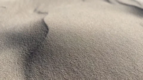 Close-Up of Wind-Blown Sand on Dunes with Blurred Background Stock Footage 281902285