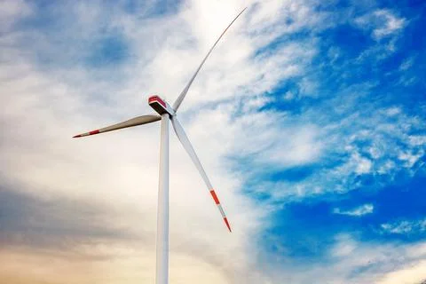 Close-up of wind generator propeller blades under dramatic sky, sustainable i Stock Photos