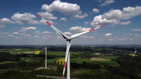 Close to Wind Turbine and Sky drone shot Stock Footage 335760065