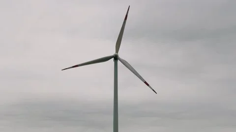Close-Up Of Wind Turbine Blades Under Cloudy Sky Stock Footage 336536268