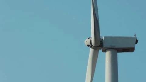 Close up of wind turbine spinning in windmills farm for energy production Stock-Footage 342623487