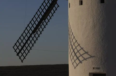Close-Up of Windmill with Shadow on White Wall Stock Photos