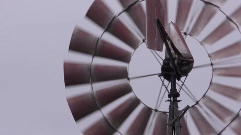Close up of Windmill spinning, rural Amish farm, Indiana USA Stock Footage