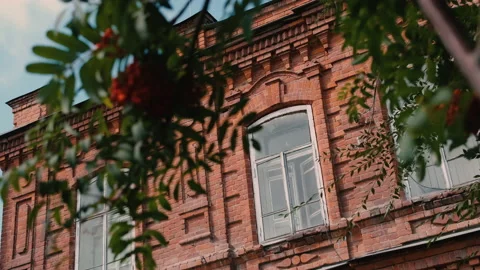 Close-up of the window of a brick old building. View of a residential building Video stock 162040814