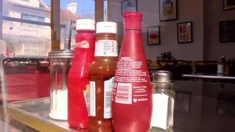 Close Up Window Greasy Café Restaurant Empty Salt Sauce Bottles Condiments Food Stock Footage 276713355