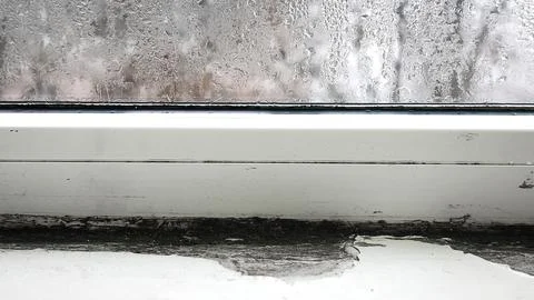Close-up of a window with heavy condensation Stock Photos