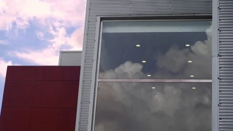 Close up of window reflecting cloudy sky and lights from inside, Portugal Video stock 128966075